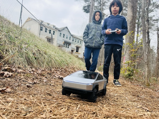 Kids drive a remote controlled Cybertruck